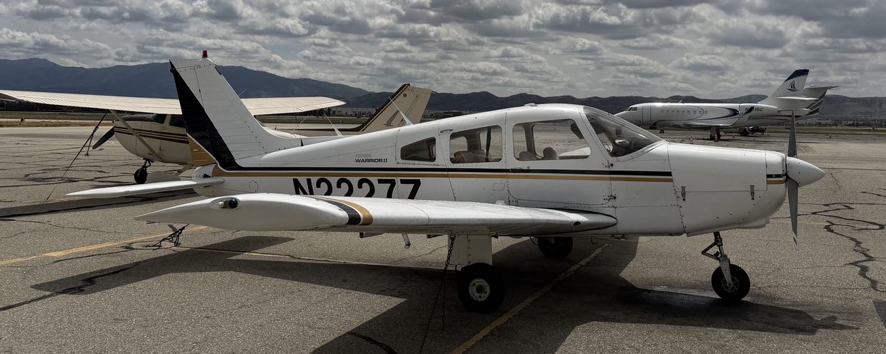 N2227Z, a 1979 Piper Warrior II with a 180 hp conversion, on the ramp at Chino Airport